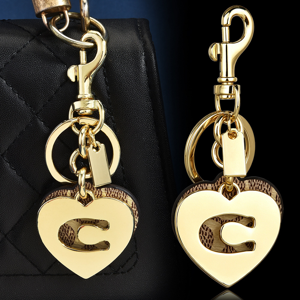 モノグラムハートフラワーバッグチャームレザーシグネチャーキャ - Monogram Keychain Leather のレビューと価格