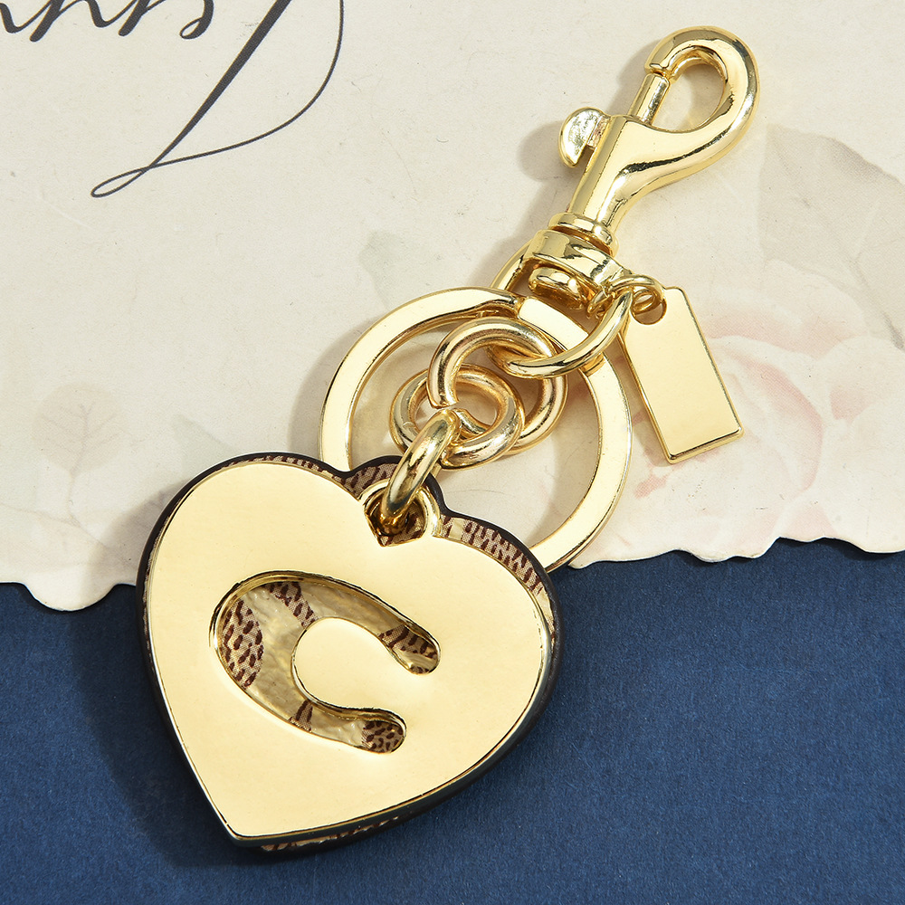 モノグラムハートフラワーバッグチャームレザーシグネチャーキャ - Monogram Keychain Leather のレビューと価格